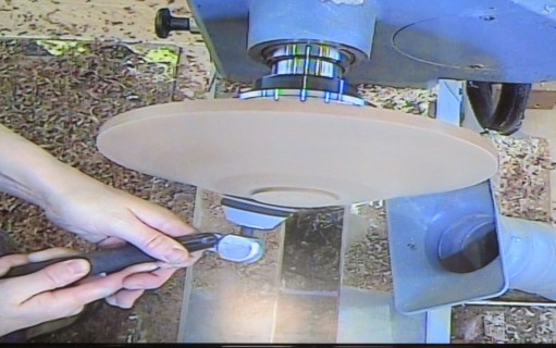 Sanding the bottom of the platter